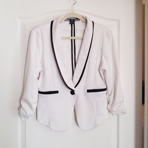 White blazer with black trim